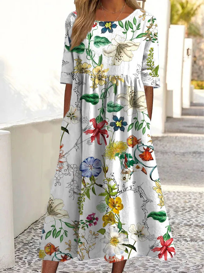 Moda® | Sukienka w subtelne kwiaty