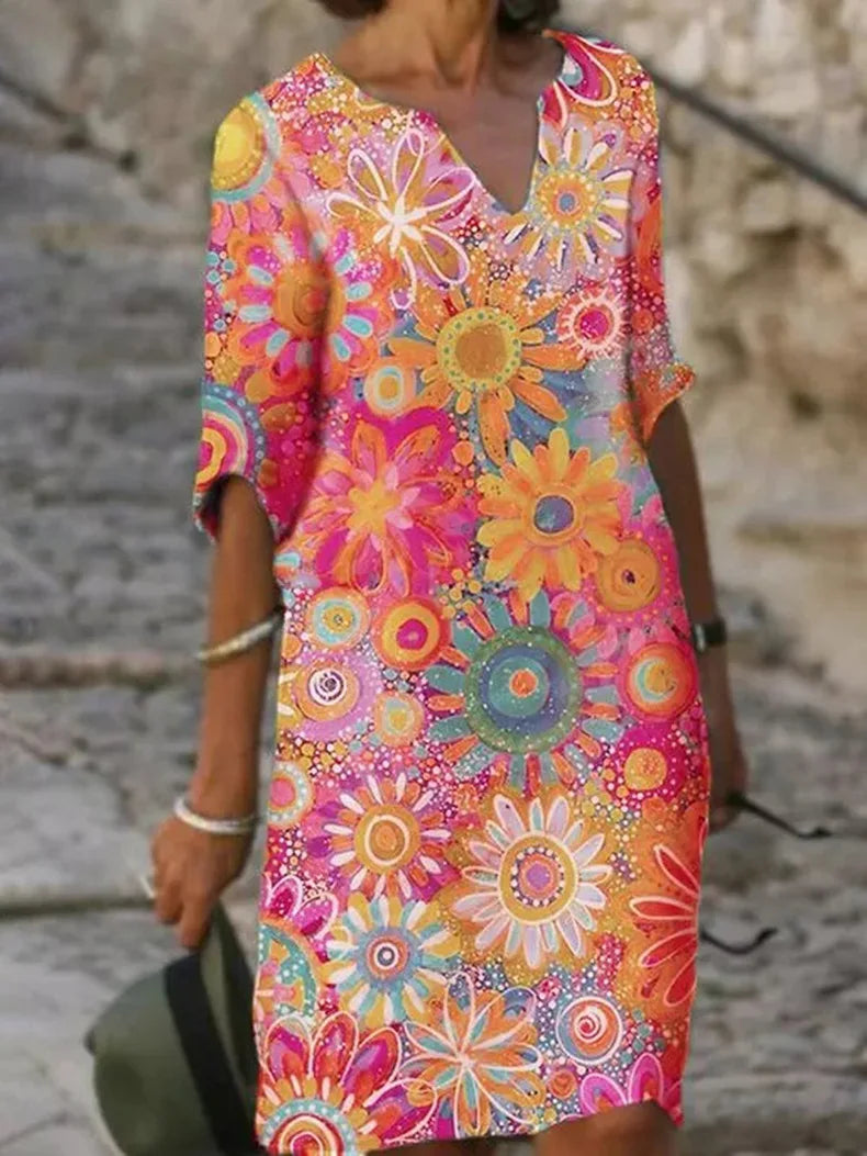 Moda™ | Casualna sukienka z kwiatowym wzorem i dekoltem w serek