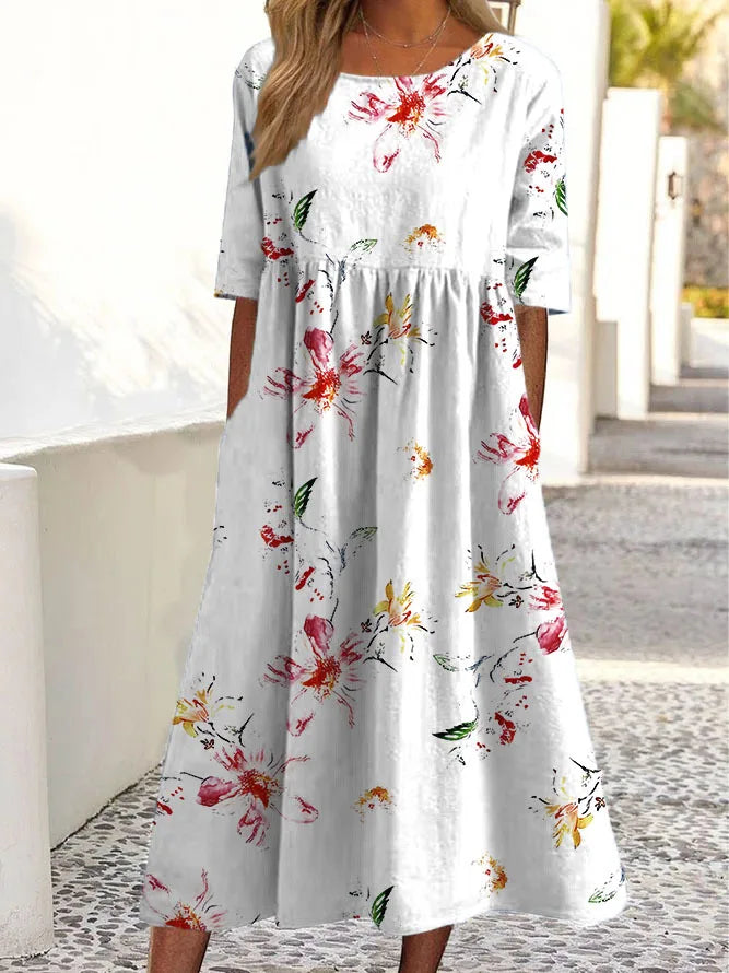 Moda® | Sukienka w subtelne kwiaty