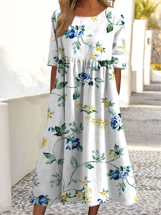 Moda® | Sukienka w subtelne kwiaty
