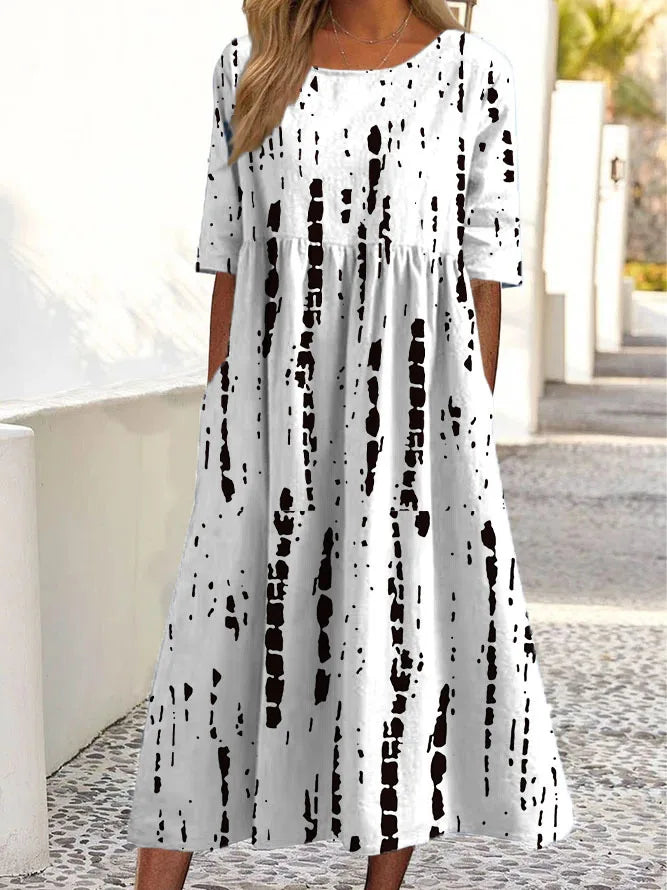 Moda® | Sukienka w subtelne kwiaty